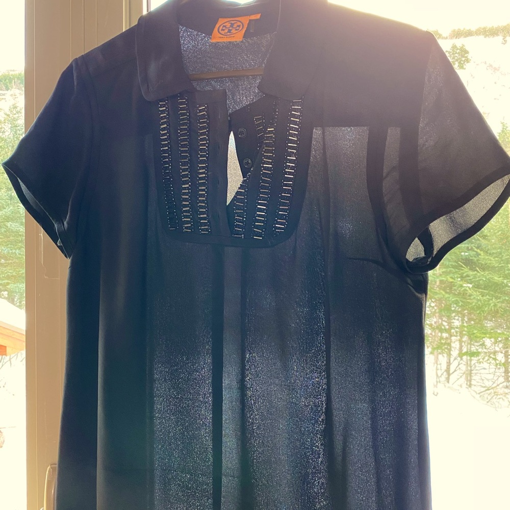 Tory Burch silk short sleeve blouse. Size petite medium. Yoke has shimmery beads